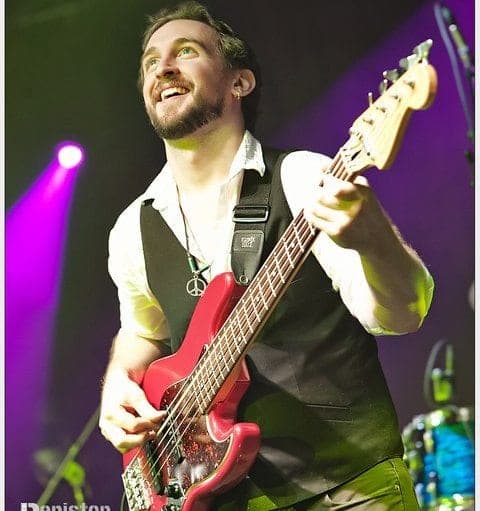 Alex playing bass at Highline